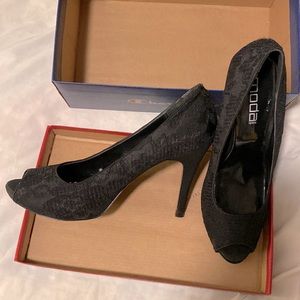 Black lace open toe 4.5 inch heels.